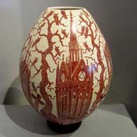 Sgraffito cathedral and Day of the Dead motif on a red-slipped beige jar