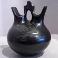 A black on black wedding vase with a geometric design