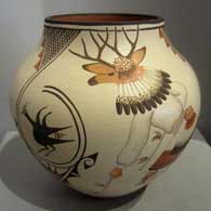 Marcellus Medina painted the dancer and geometric design on this pot