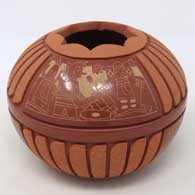 A Potsuwi'i-style jar with a sgraffito and painted design and some micaceous clay slip