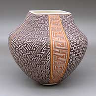 A polychrome jar with a square opening and four-panel geometric design
 by Frederica Antonio of Acoma