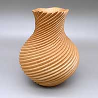Micaceous gold spiral melon jar with a flared, organic opening
 by Dominique Toya of Jemez
