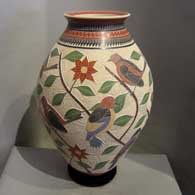 Sgraffito and painted designs on a polychrome vase