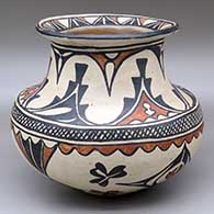 A classic San Ildefonso polychrome jar decorated around the body with two three-panel bands of geometric design, plus another band of geometric design on the upper side of the rim
 by Maria Martinez of San Ildefonso