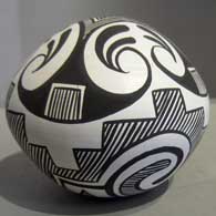 Traditional Zuni design on a black and white seedpot