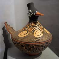 A polychrome duck pot by Anderson Peynetsa Polychrome Zuni duck pot