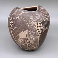 Sienna jar with a sgraffito wildlife and geometric design