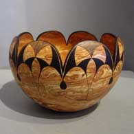 Black geometric design on a marbleized clay jar