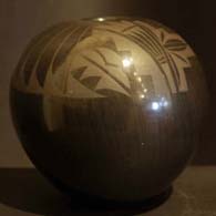 Black-on-black jar decorated with a geometric design