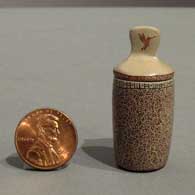 Geometric design on a miniature lidded jar