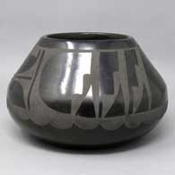 Black-on-black jar decorated with a geometric design