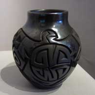 Carved black jar by Daniel Begay