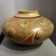 Sikyatki-style yellow ware jar with migration pattern design