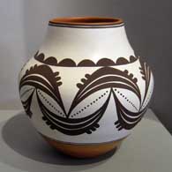 Black and white geometric design on a polychrome water jar