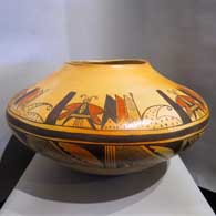 Polychrome jar with mothman and geometric design Grace Chapella added a mothman and geometric design to this polychrome jar