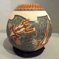 Polychrome jar with a sgraffito and painted horned toad and geometric design
