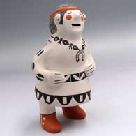 A standing Singing Grandmother figure