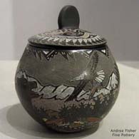 Polychrome lidded jar with a sgraffito-and-painted wildlife and nature design