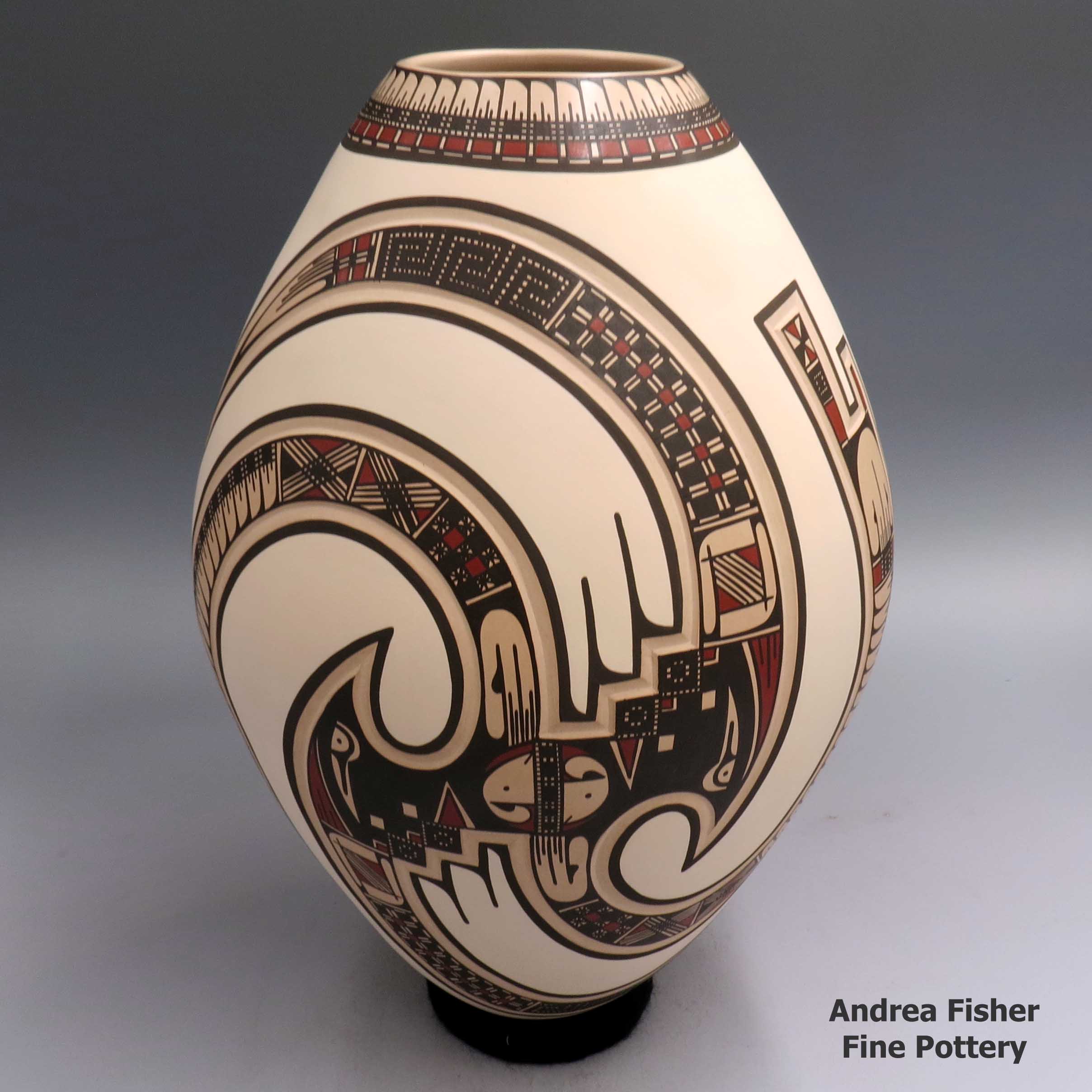 Polychrome jar lightly carved and painted with a Paquime-derived geometric design