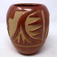 Red jar carved with a geometric design
