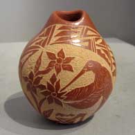 Sgraffito design on a red seedpot