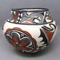 Zuni rosettes and geometric design on a polychrome jar