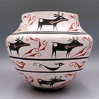 A polychrome jar with 4 bands of deer-with-heart-line, Zuni rain bird and geometric design
