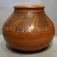 A polychrome jar with lightning bolt, bird element and geometric design