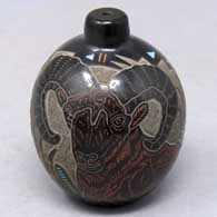 Miniature polychrome seed pot with sgraffito and painted bighorn ram, ram dancer and geometric design
