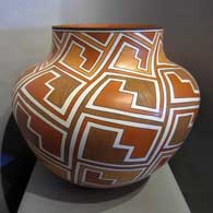 Polychrome jar with geometric design Geometric design on a polychrome jar