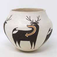 The Zuni deer and heart line decorate this polychrome jar by Rose Chino Garcia