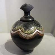 Etching, silver accent and heishi beads on a lidded, burnished jar