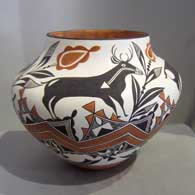 Deer, heart line, floral and geometric design from c. 1900 on a polychrome jar