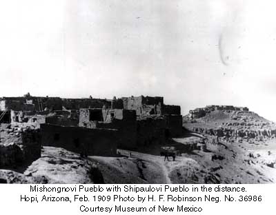 Mishongnovi Pueblo with Shipaulovi Pueblo in the distance.  
Hopi, Arizona, Feb. 1909