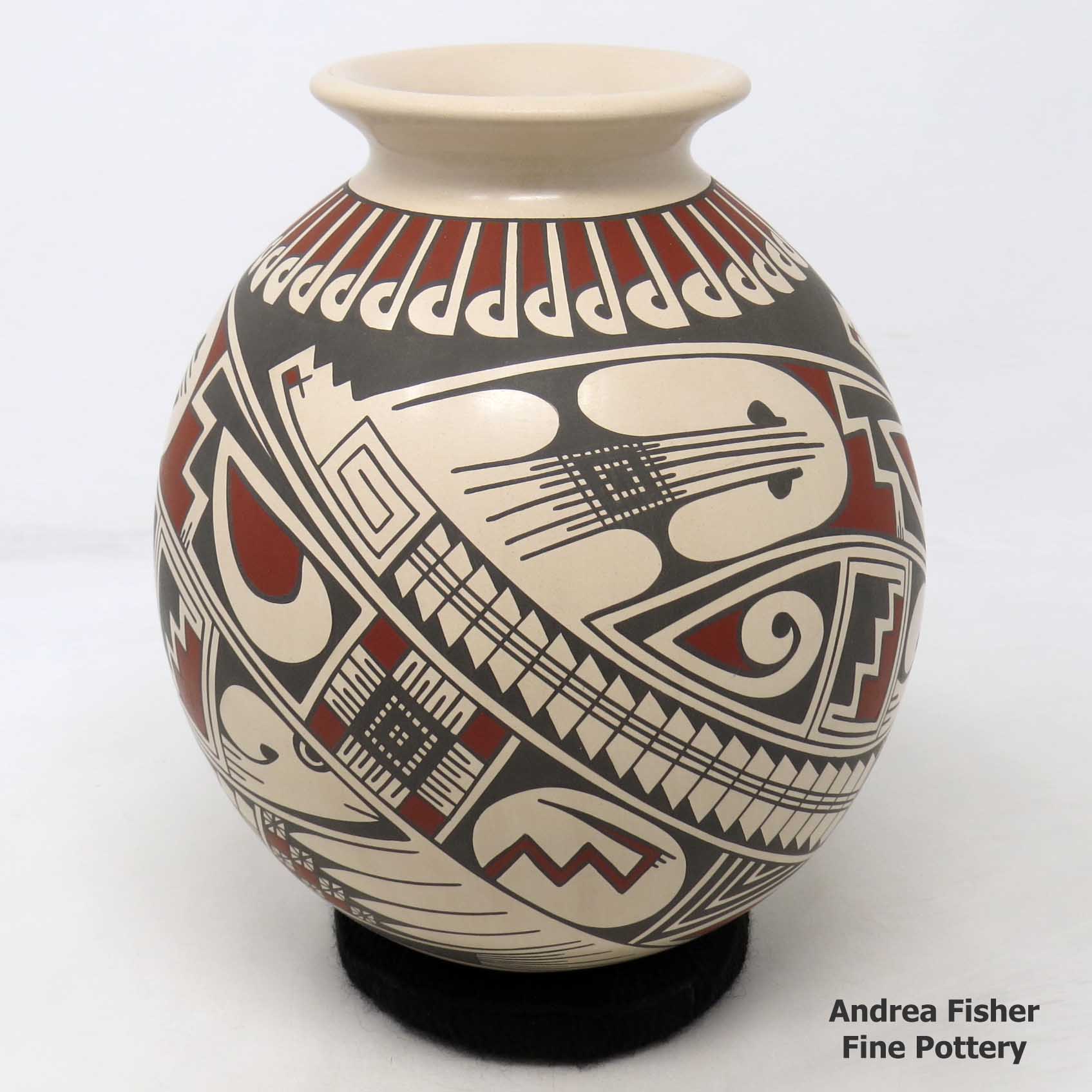 Click or tap to see a larger view Polychrome jar with geometric design
made by Rodrigo Perez of Mata Ortiz and Casas Grandes