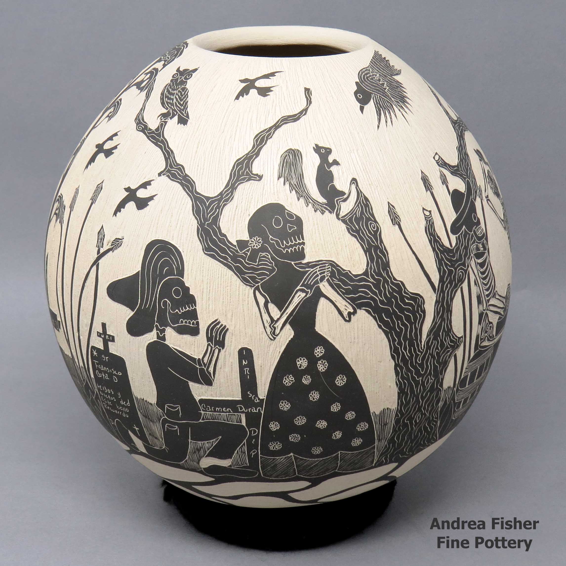 Click or tap to see a larger view Black and white jar with sgraffito Day of the Dead motif made by Alfredo Rodriguez of Mata Ortiz and Casas Grandes
