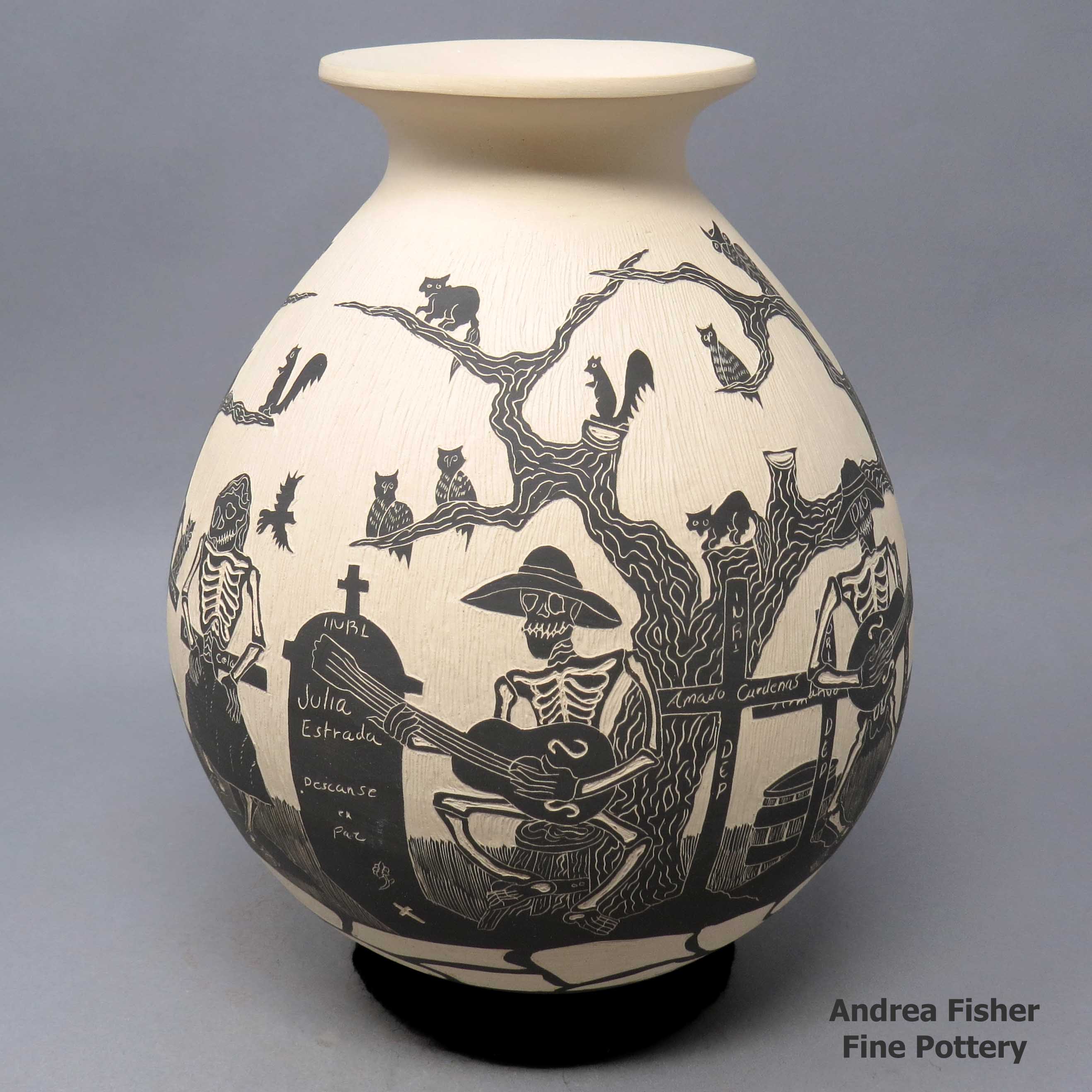 Click or tap to see a larger view Black and white jar with sgraffito Day of the Dead motif made by Alfredo Rodriguez of Mata Ortiz and Casas Grandes