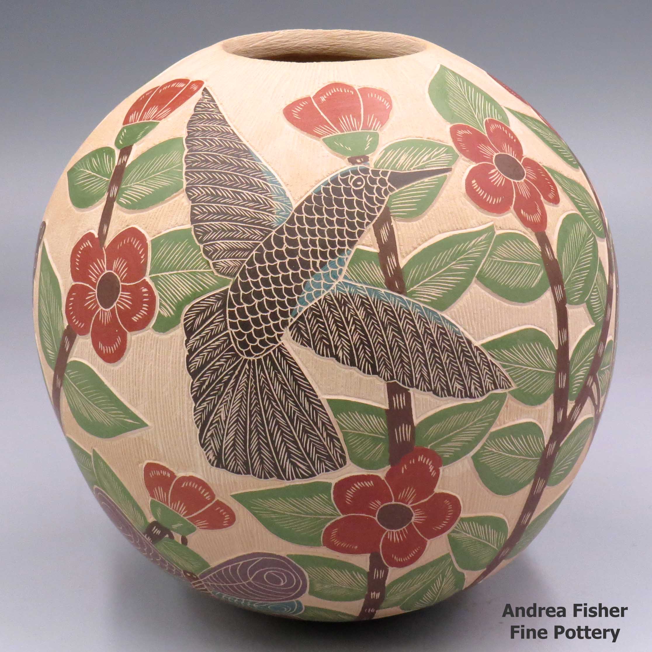 Click or tap to see a larger view Polychrome jar with sgraffito and painted bird, branch and flower design
made by Blanca Arras of Mata Ortiz and Casas Grandes