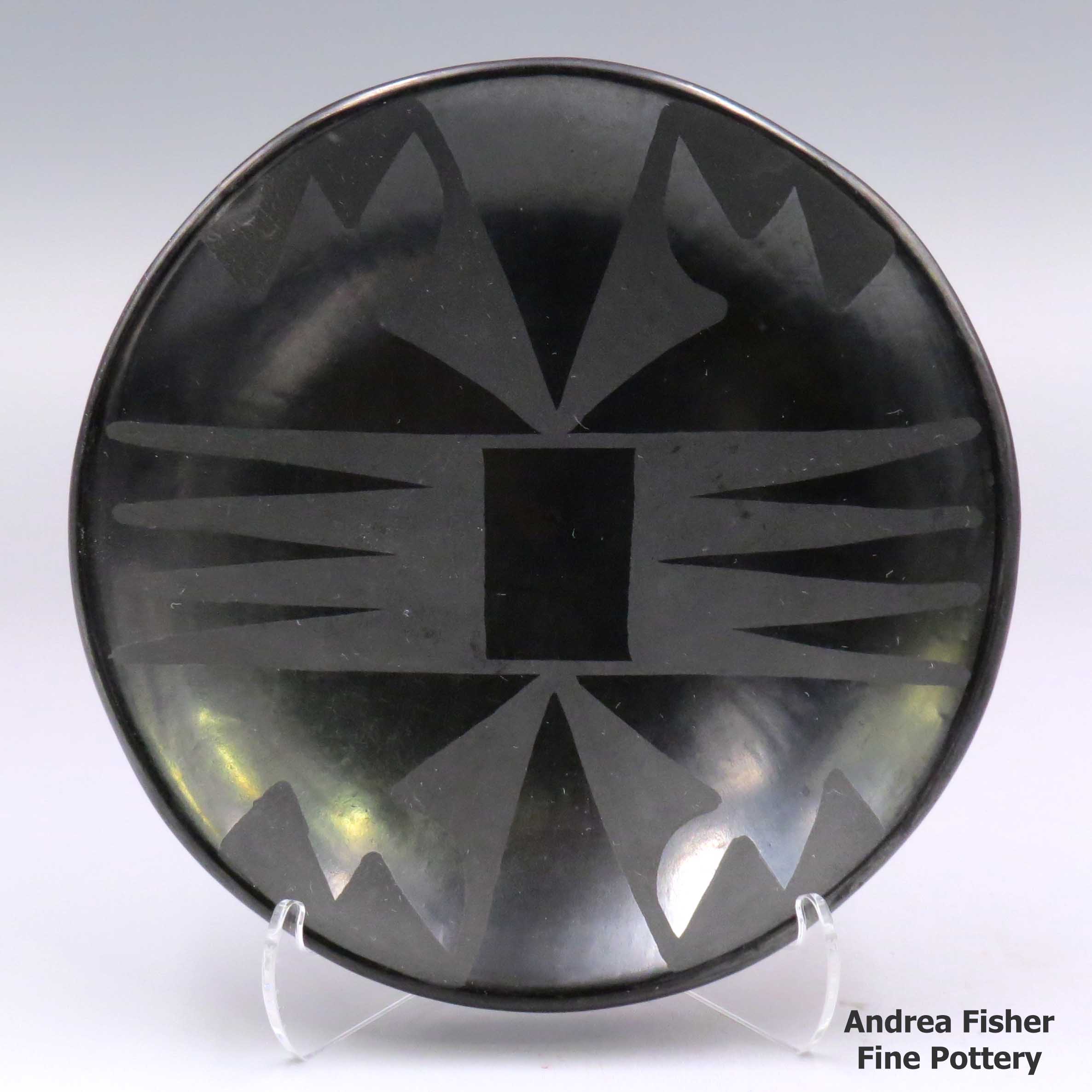 Click or tap to see a larger view Black-on-black plate with a geometric design made by Maria Martinez of San Ildefonso