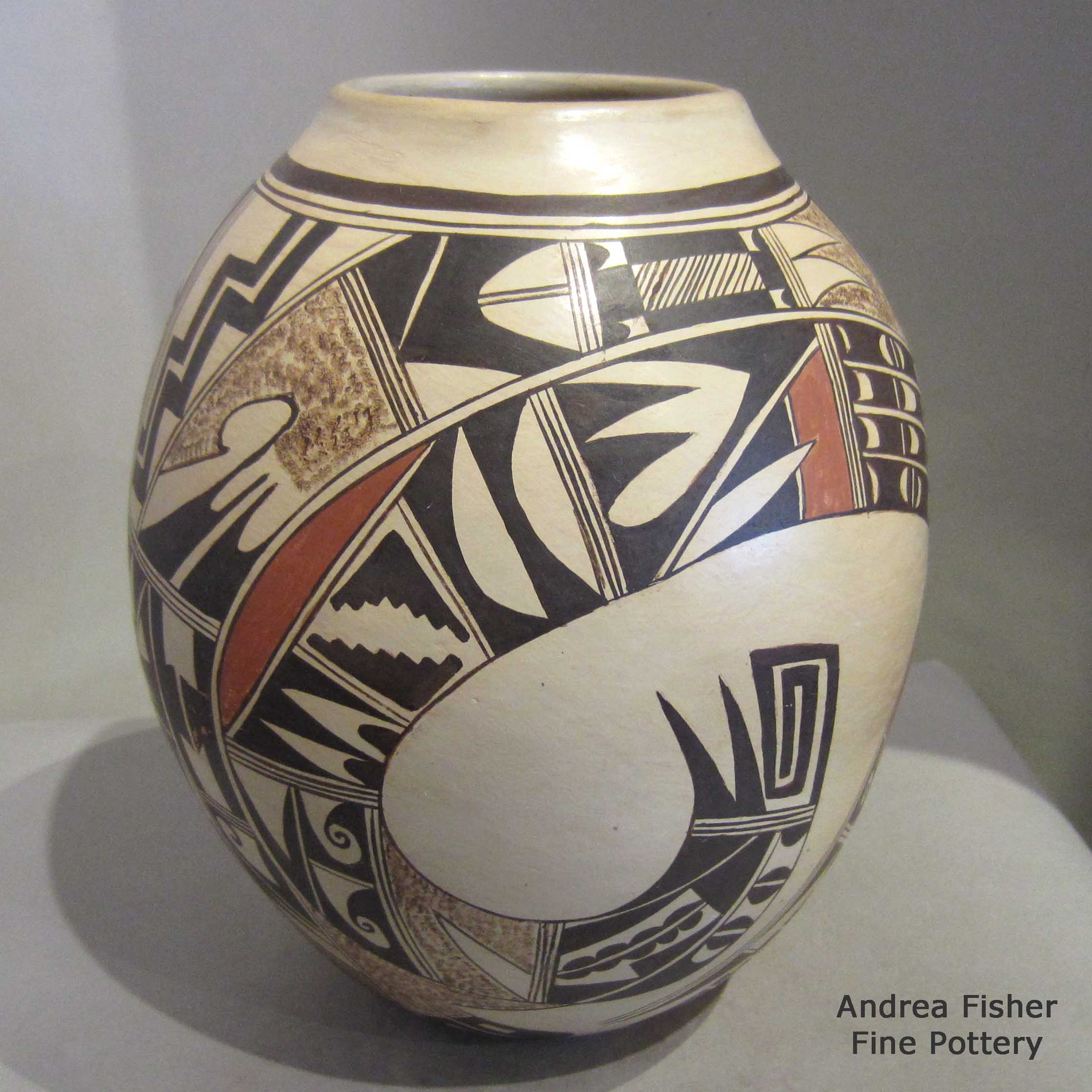 Stella Huma created this piece Polychrome jar with bird element and geometric design plus fire clouds