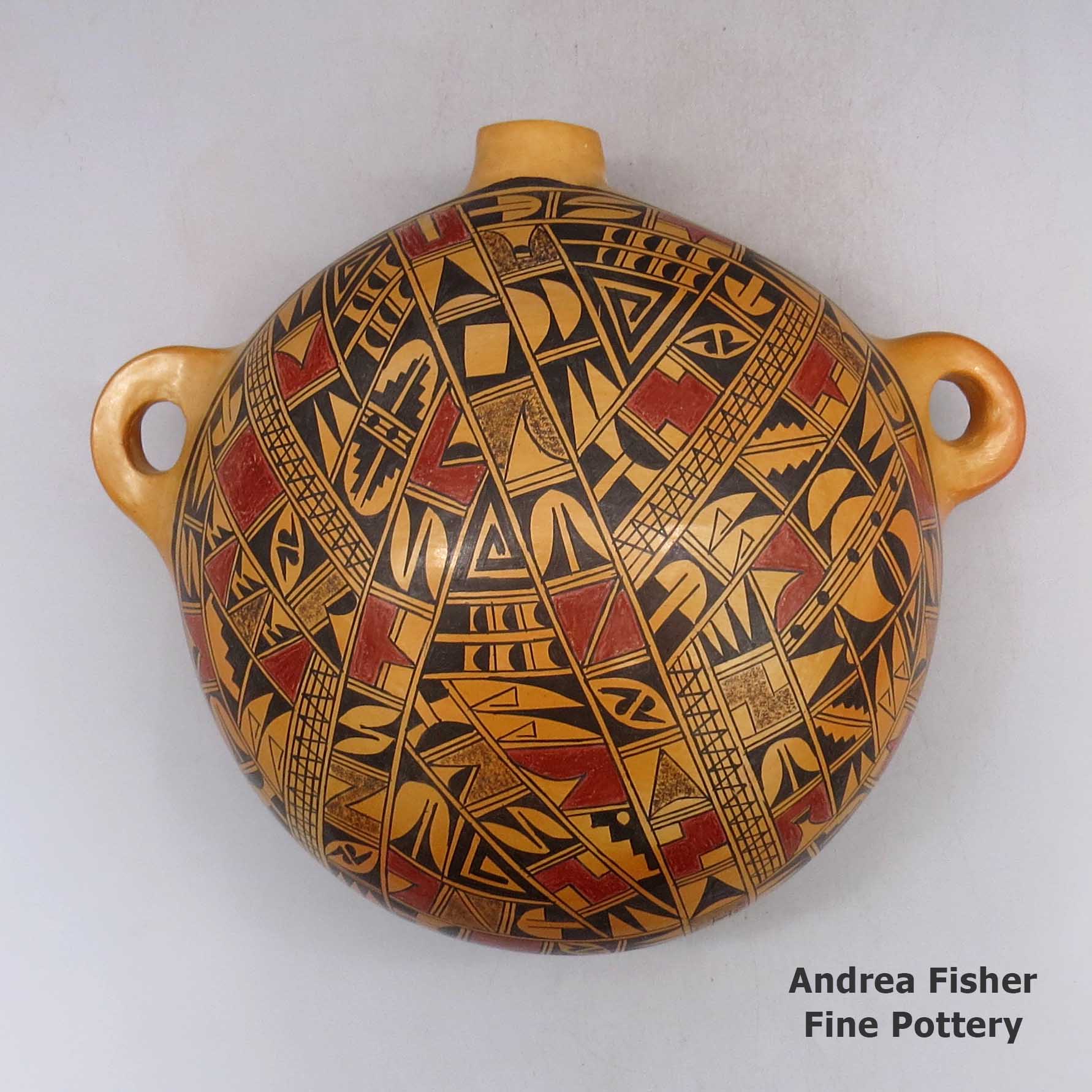 Polychrome canteen with geometric design and fire clouds made by Emma Naha of Hopi
