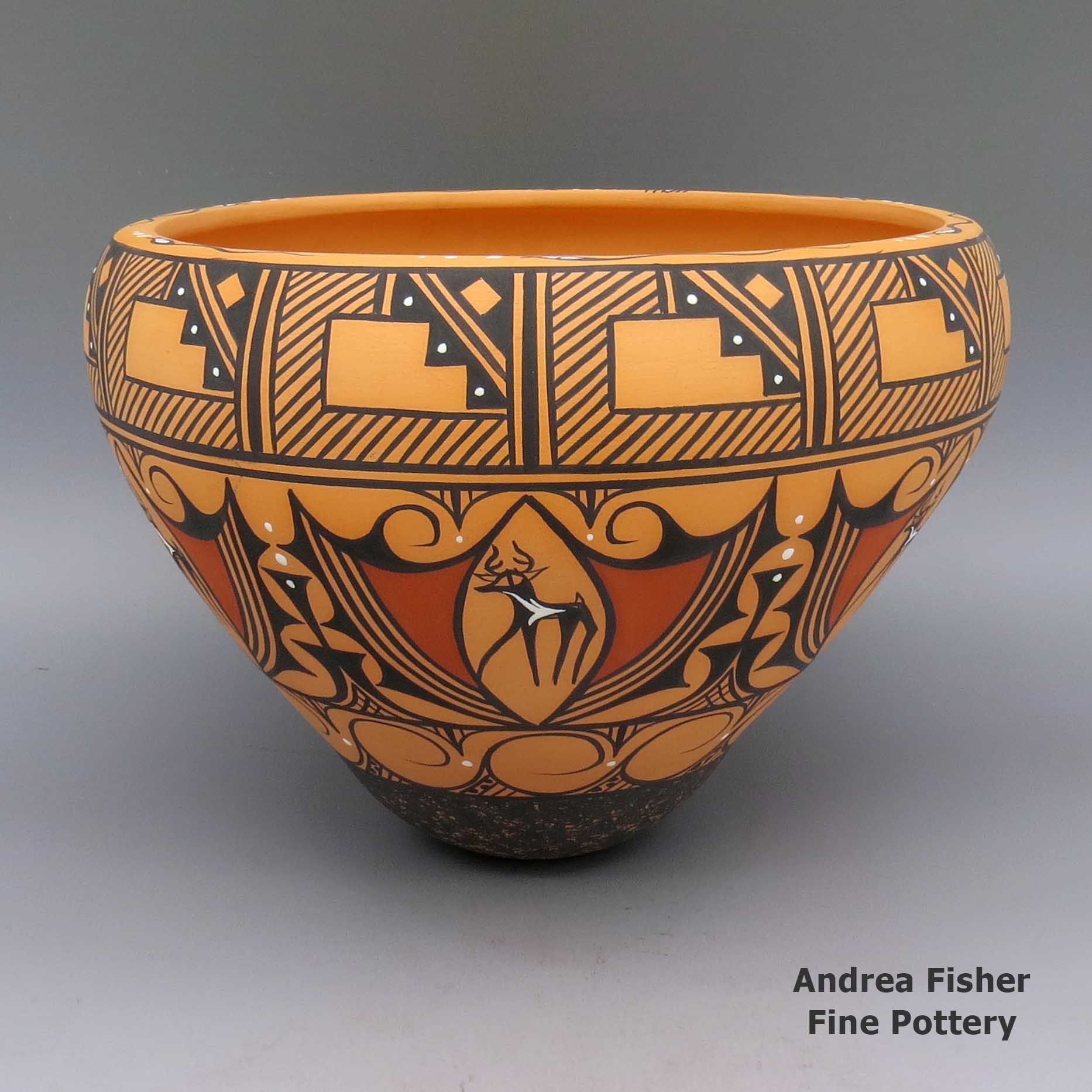 Polychrome jar with deer with heart line, snake, kiva step, and geometric design made by Priscilla Peynetsa of Zuni