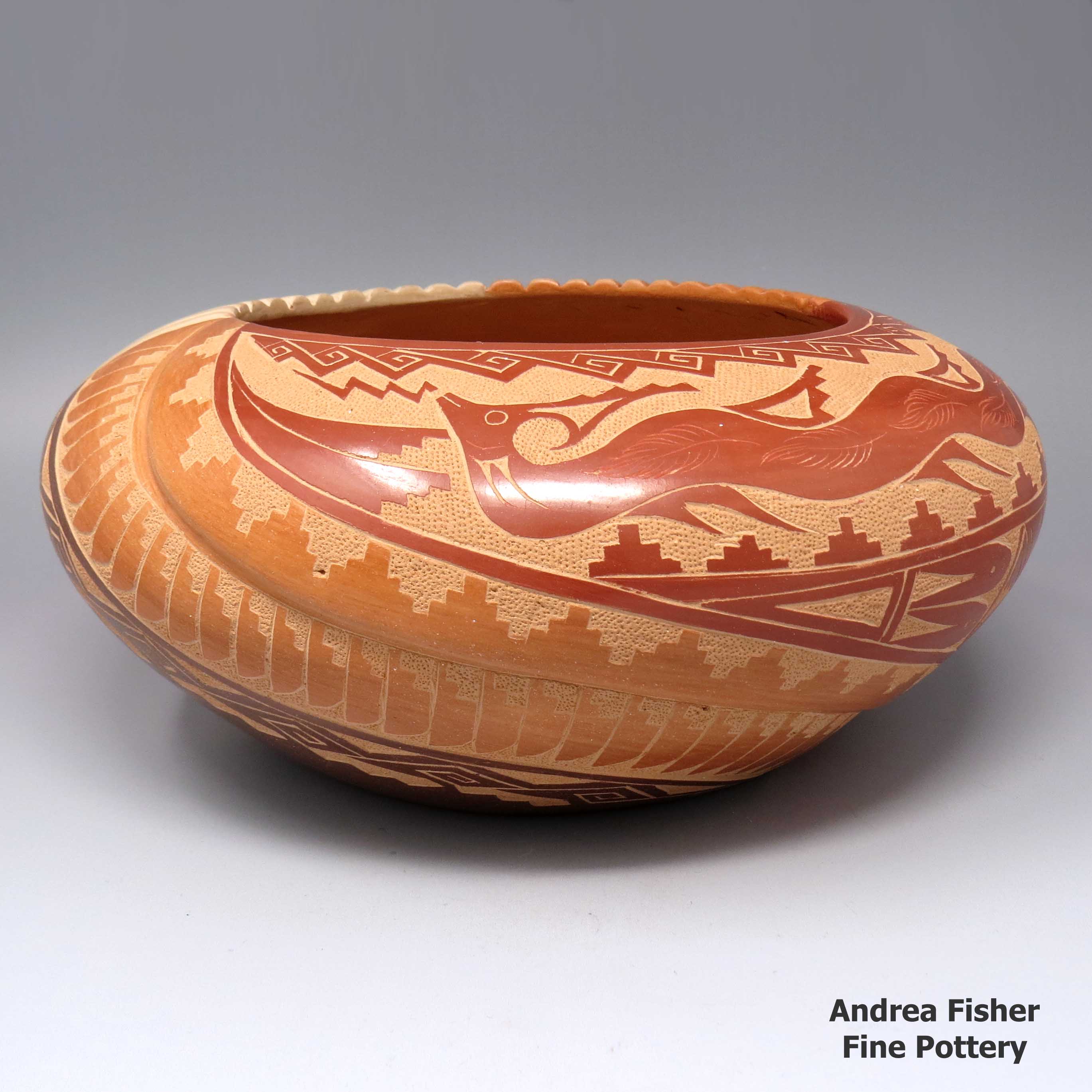 Vangie Tafoya created this piece, Click or tap to see a larger version Polychromebowlpartiallycarvedwithmelonribsplusasgraffitoavanyu,featherandgeometricdesign, Click or tap to see a larger version