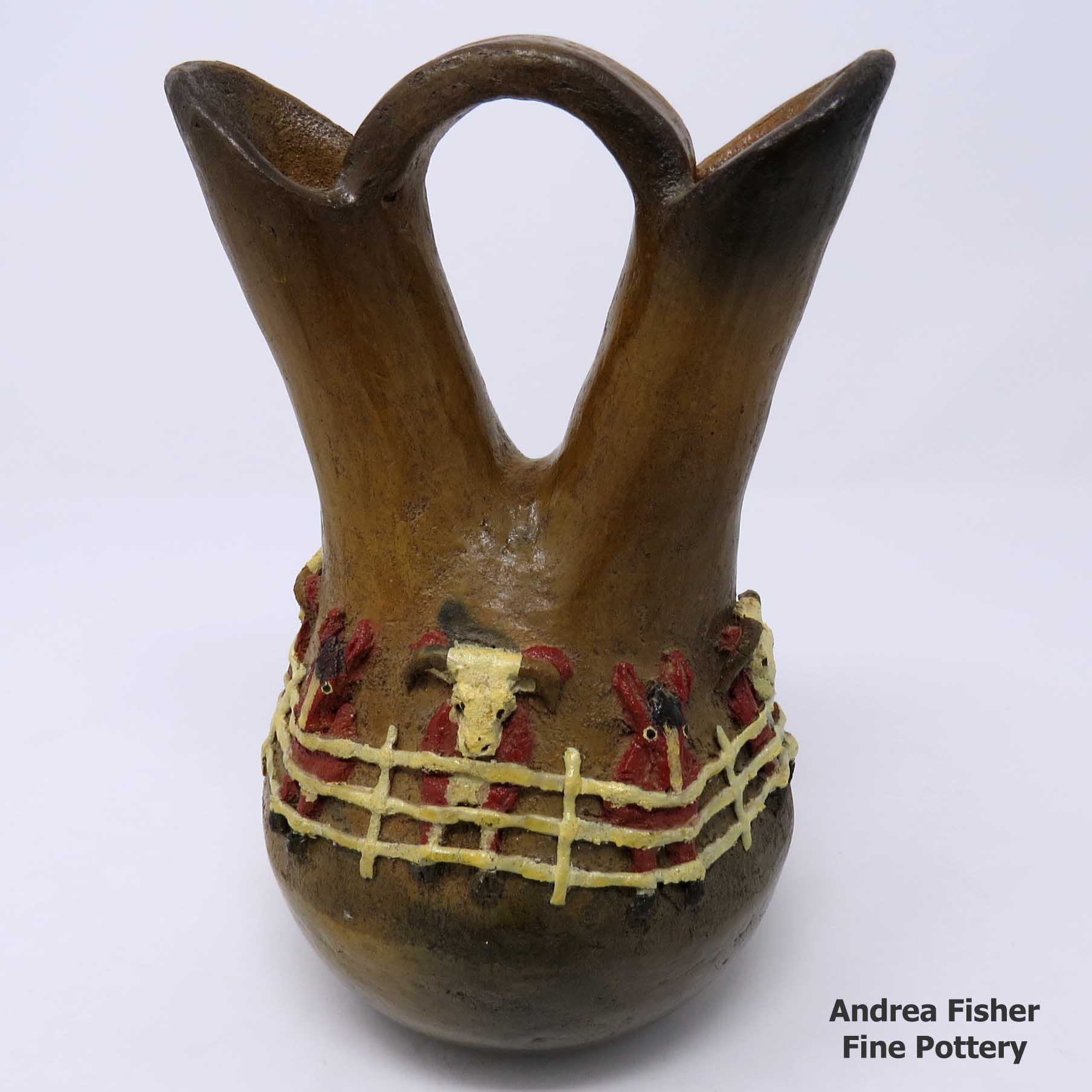 Click or tap to see a larger view Polychrome wedding vase with fire clouds plus cattle and fence design
made by Silas Claw of Navajo