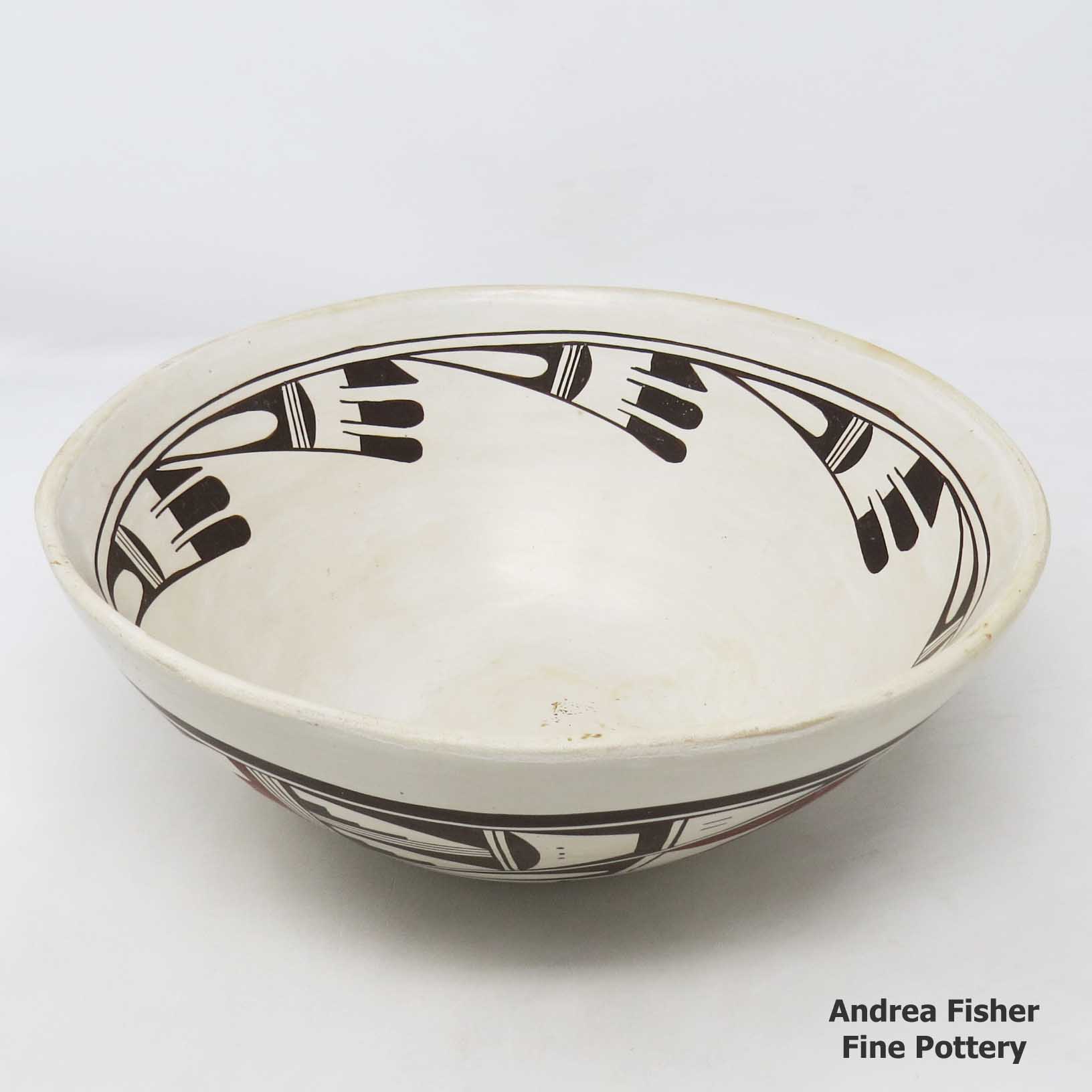 Click or tap to see a larger view Polychrome bowl with bird element design inside, bird element and geometric design outside
made by Joy Navasie aka 2nd Frogwoman of Hopi
