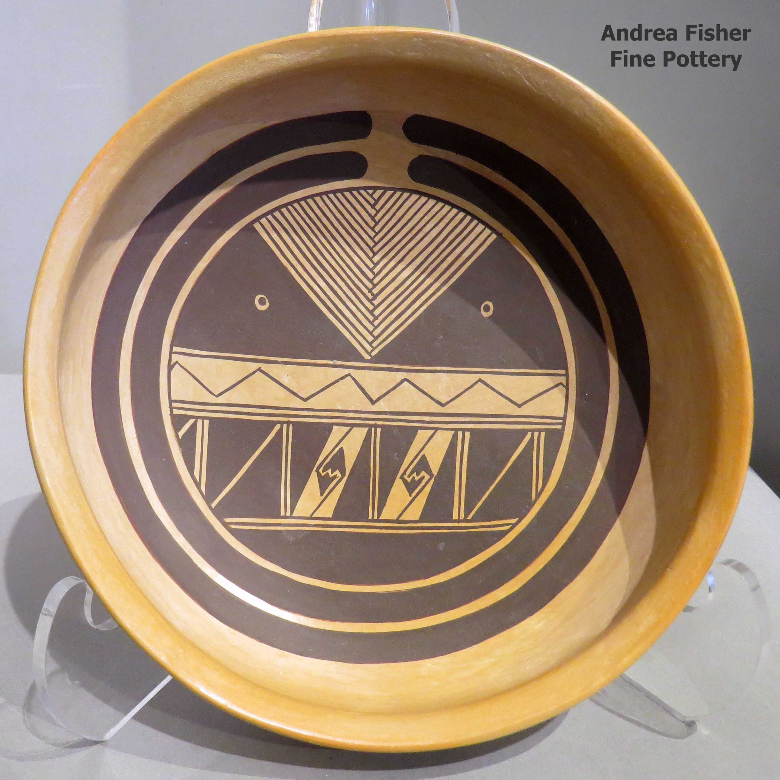 Click or tap to see a larger view Black on yellow bowl with geometric design inside and out made by Rachel Sahmie of Hopi