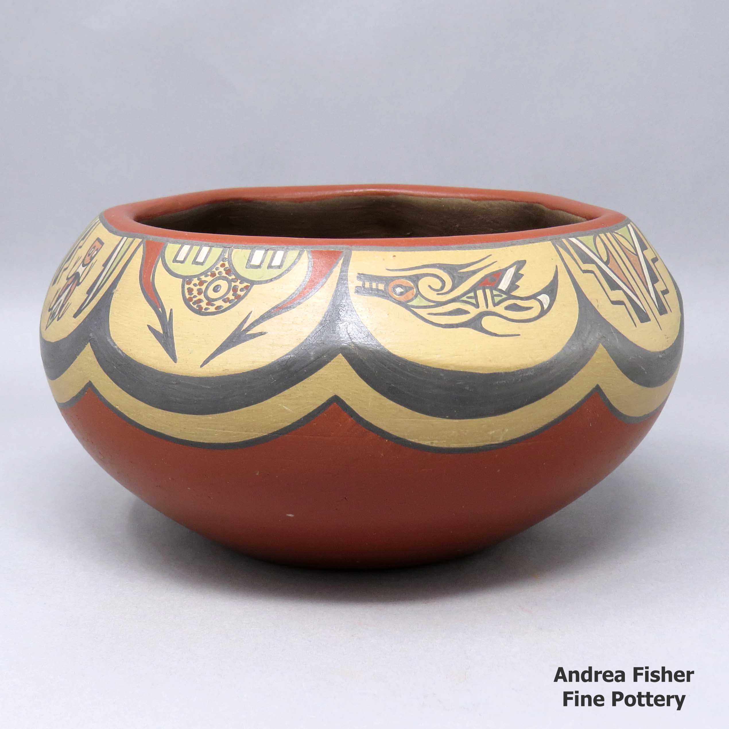 Click or tap to see a larger view Polychrome bowl with 8 facets, each with a separate design made by Margaret and Luther Gutierrez of Santa Clara