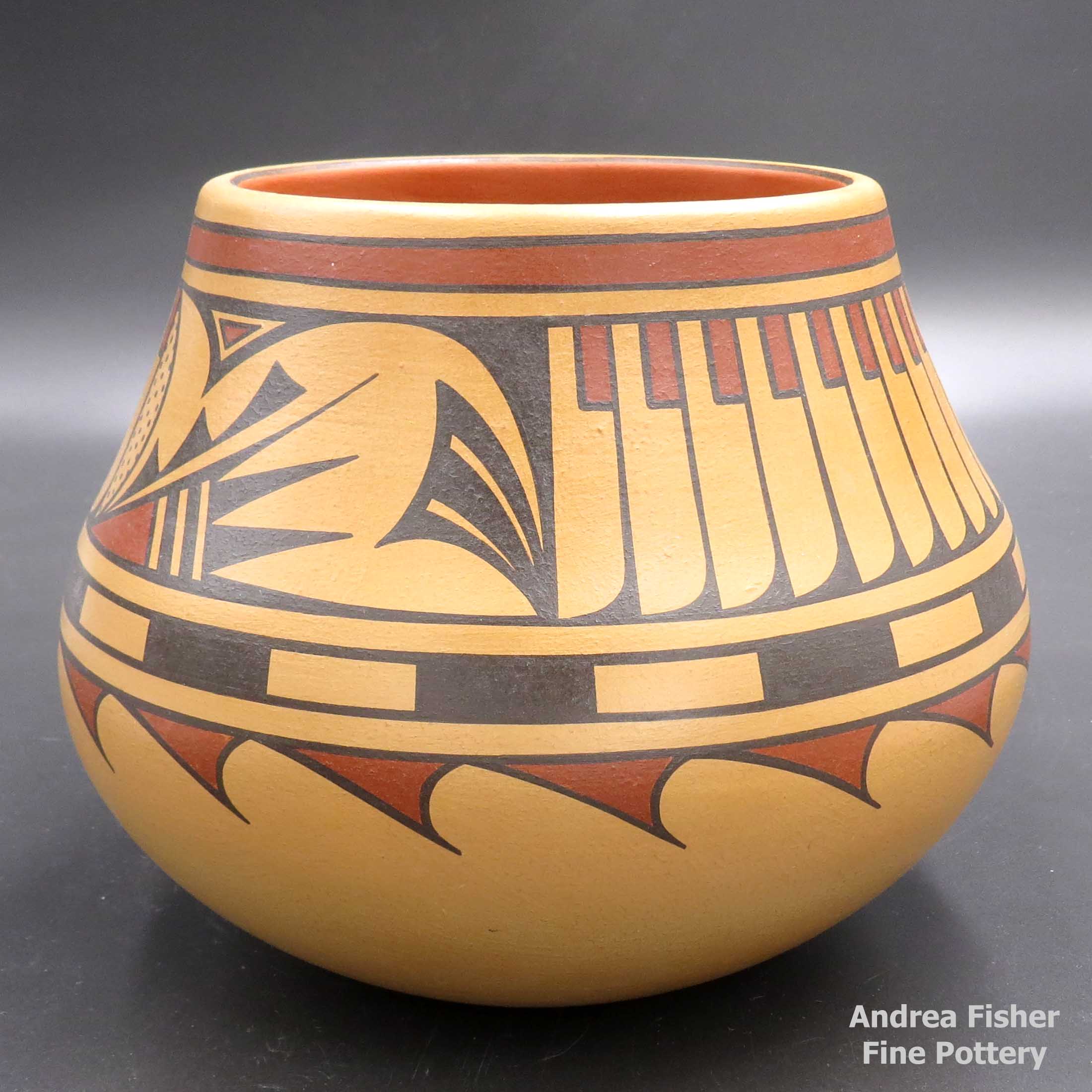 Click or tap to see a larger view Polychrome jar with 4-panel feather and geometric design made by Cavan Gonzales of San Ildefonso