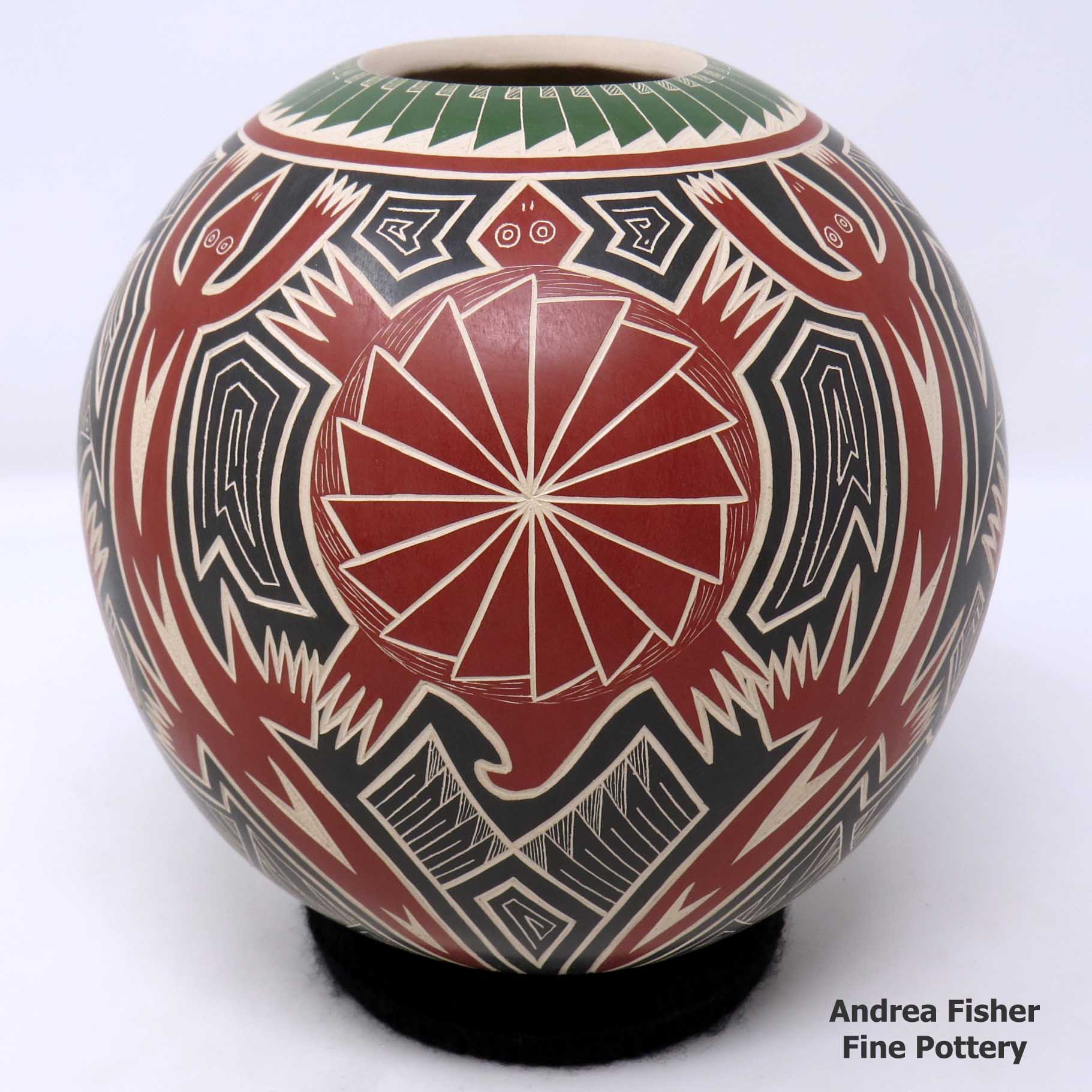 Click or tap to see a larger view Polychrome jar with sgraffito and painted lizard, turtle and geometric design made by Humberto Pina of Mata Ortiz and Casas Grandes