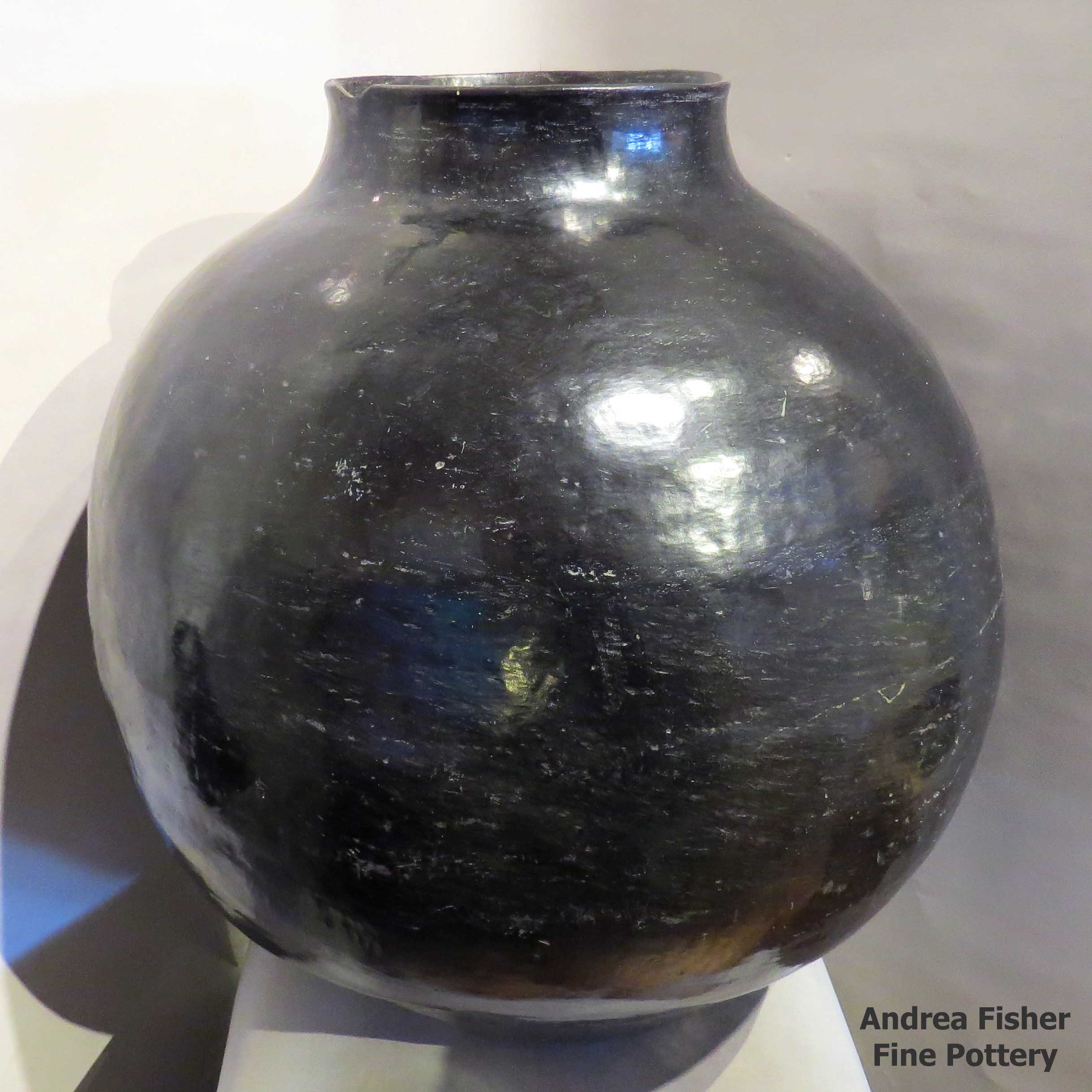 Click or tap to see a larger view Mother of Margaret, Large polish black storage jar made by Sarafina Tafoya of Santa Clara